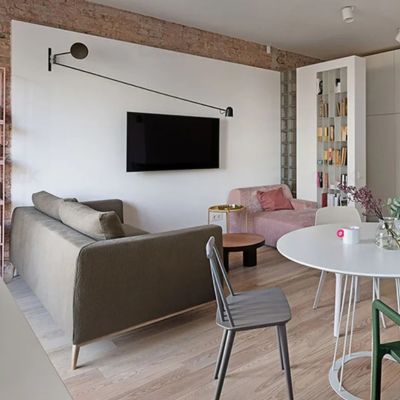 Applique murale bras articulé LED orientable dans salon salle à manger