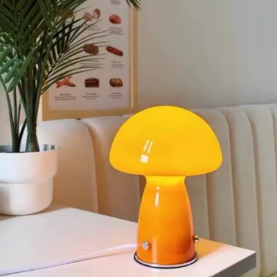 lampe champignon orange en verre design Bauhaus sur table blanche