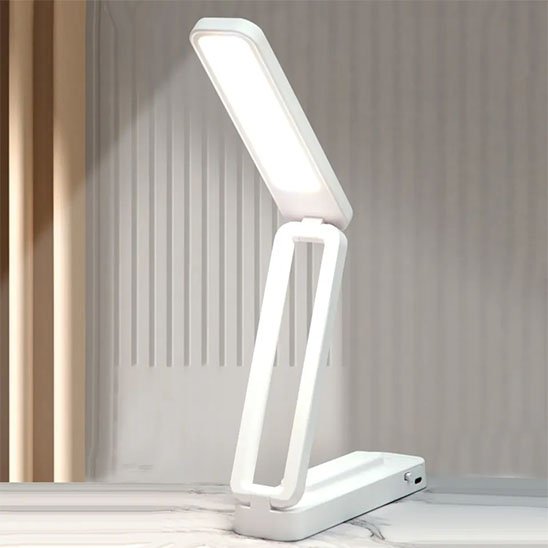 lampe de bureau LED pliable portable blanche et polyvalente tactile esthétique et fonctionnalité rechargeable