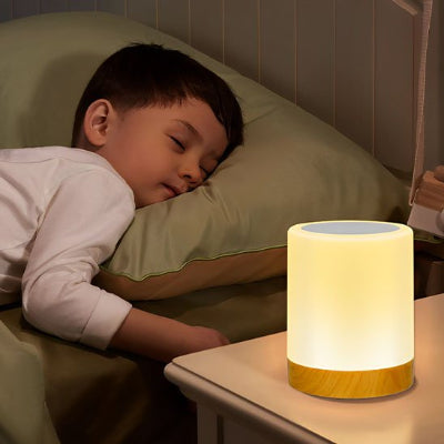 Lampe de chevet tactile table de nuit petit garcon dort dans lit
