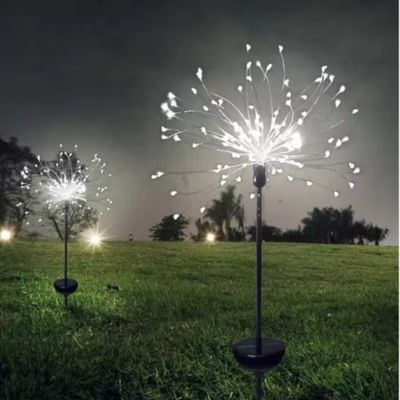 Lampe solaire exterieur étoile filante lumière blanche type feu artifice dans champ