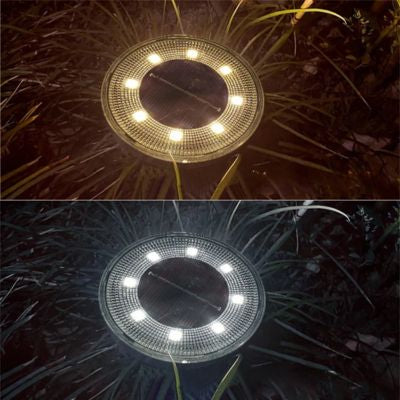 Lampe solaire spot ancastrable au sol démontrant les deux options de lumières chaude ou froide