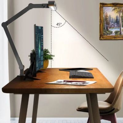 Lampes de bureau moniteur noire protection yeux avec angle rotation 45 degrés sur bureau bois avec clavier documents horloge bleue plante et tableau paysage